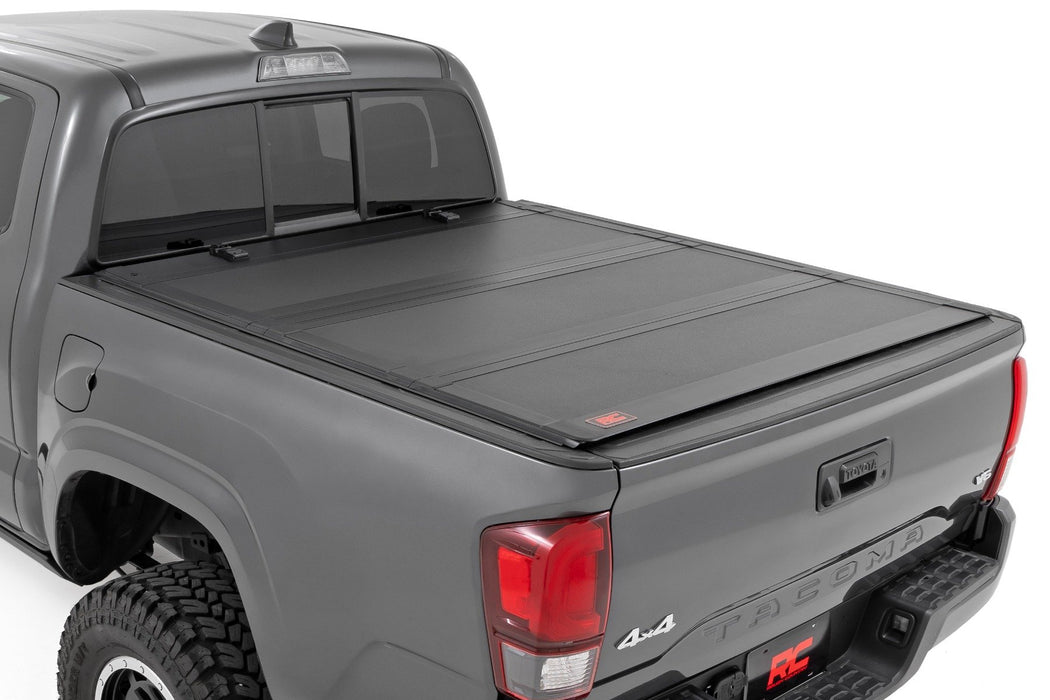 Rough Country Hard Tri-Fold Flip Up Bed Cover - 6' Bed | Toyota Tacoma 2WD/4WD (2005-2015)