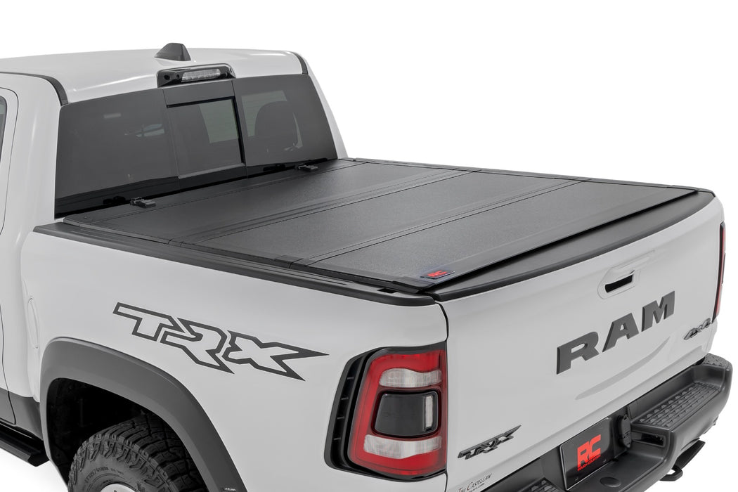 Hard Tri-Fold Flip Up Fold Bed Cover - 5'7 inch Bed - Ram 1500 (19-25)/1500 TRX (21-24)