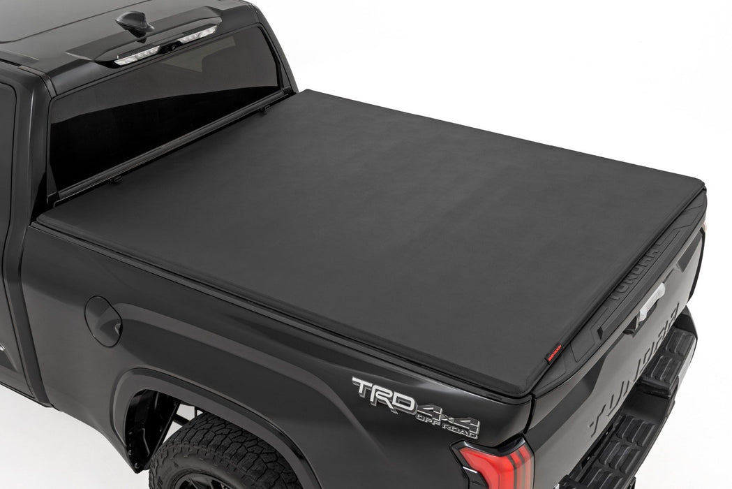 Rough Country Soft Tri-Fold Bed Cover - With &amp; W/O OE Rails - 6'7" Bed | Toyota Tundra (22-26)