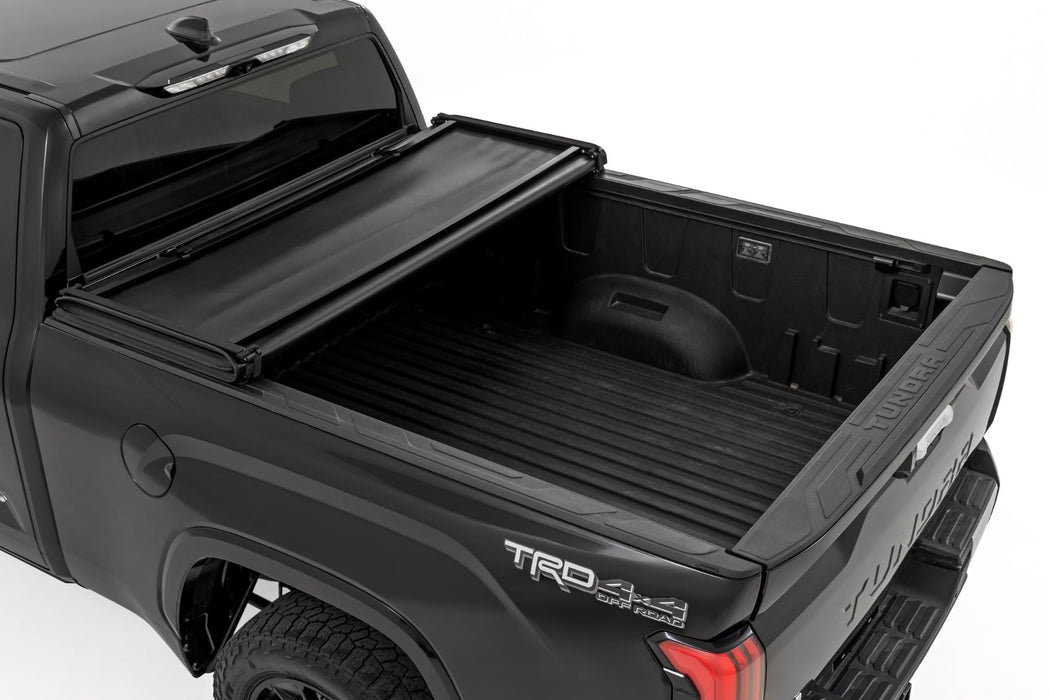Rough Country Soft Tri-Fold Bed Cover - With &amp; W/O OE Rails - 6'7" Bed | Toyota Tundra (22-26)