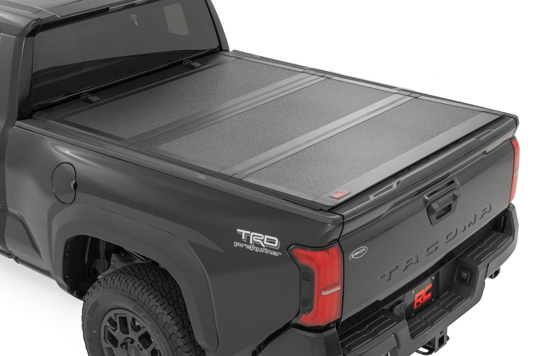 Rough Country Hard Tri-Fold Flip Up Bed Cover - 6' Bed | Toyota Tacoma 2WD/4WD (2024-2025)
