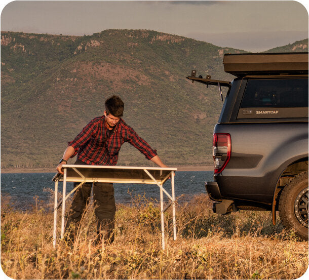 Stowaway Table - Fits Jeep Series CapsFits Caps w/Serial Number Ending In NA with a 5' Bed